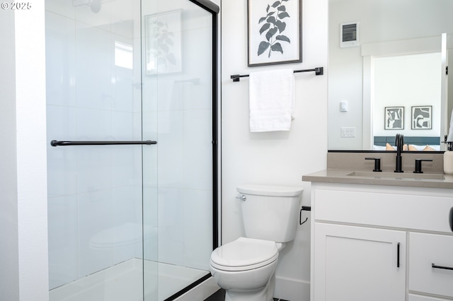 319 N Holland St, Portland, OR 97217 - bathroom featuring toilet, vanity, and a shower stall
