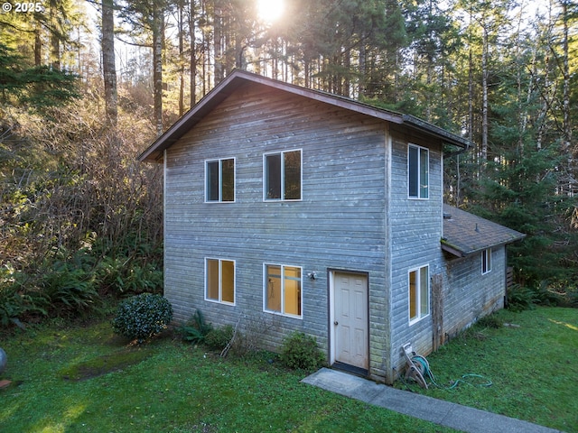 exterior space featuring a front lawn