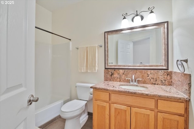 full bathroom with toilet, tasteful backsplash, shower / bathing tub combination, vanity, and tile patterned flooring