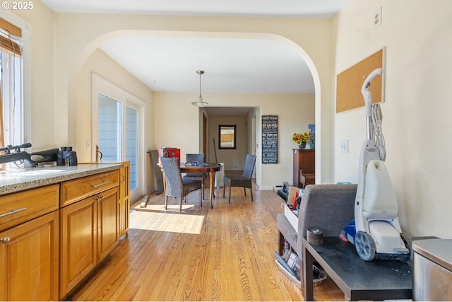31958 J P W Rd, Scappoose, OR 97056 - dining space with arched walkways and light wood finished floors