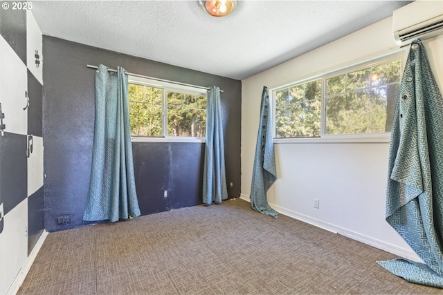31958 J P W Rd, Scappoose, OR 97056 - unfurnished room with a wall unit AC, carpet, and baseboards