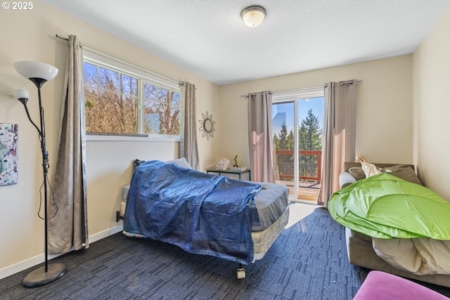 31958 J P W Rd, Scappoose, OR 97056 - bedroom with access to outside, multiple windows, and baseboards