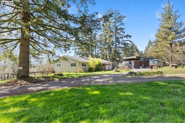 31958 J P W Rd, Scappoose, OR 97056 - view of front of house with a chimney and a front lawn