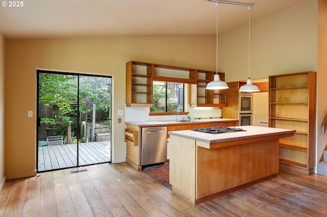 6438 SW Barnes Rd, Portland, OR 97221 - kitchen with open shelves, a kitchen island, appliances with stainless steel finishes, light countertops, and high vaulted ceiling