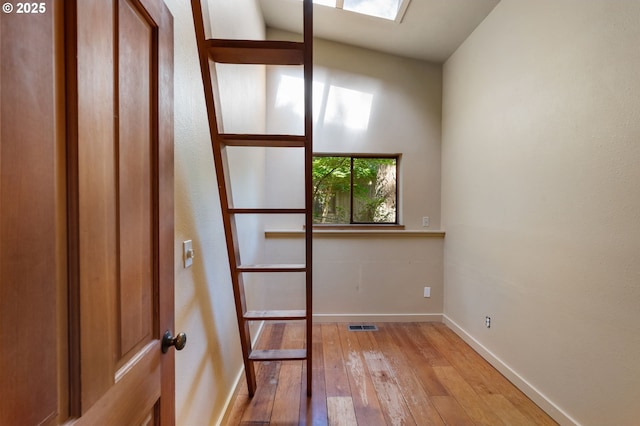 6438 SW Barnes Rd, Portland, OR 97221 - unfurnished room featuring light wood-style flooring and baseboards