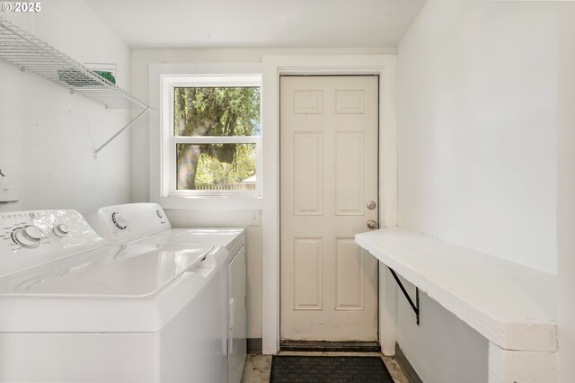 laundry room with laundry area and separate washer and dryer