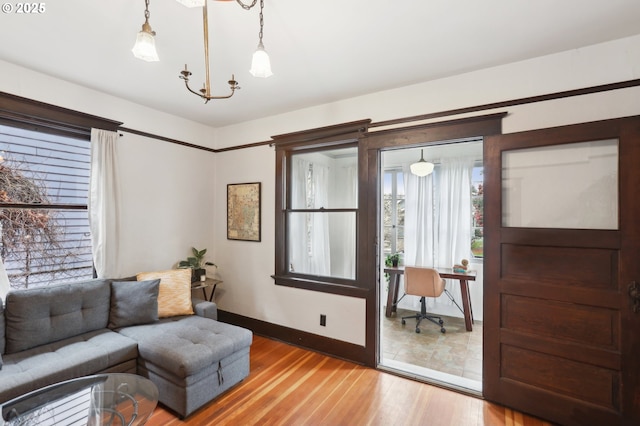 4121 N Albina Ave, Portland, OR 97217 - doorway featuring baseboards and light wood finished floors