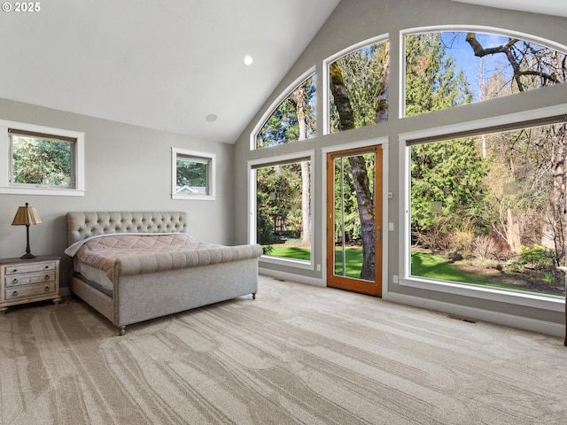 carpeted bedroom featuring recessed lighting, visible vents, high vaulted ceiling, and access to outside