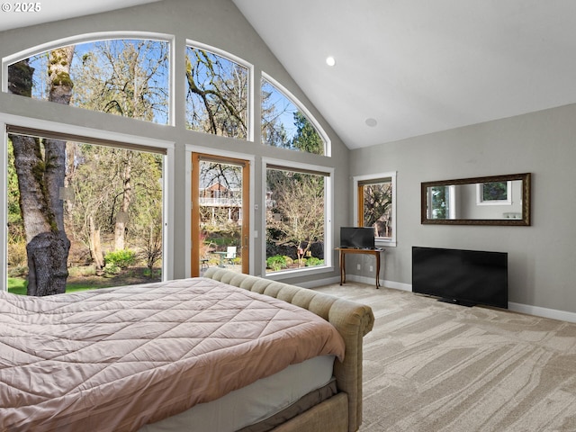 carpeted bedroom with recessed lighting, baseboards, and high vaulted ceiling