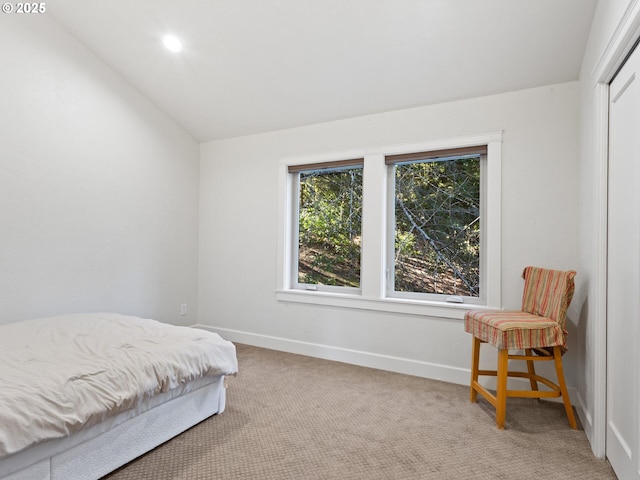 bedroom featuring recessed lighting, baseboards, light carpet, and lofted ceiling