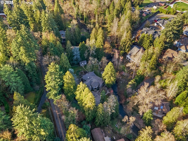 aerial view featuring a view of trees