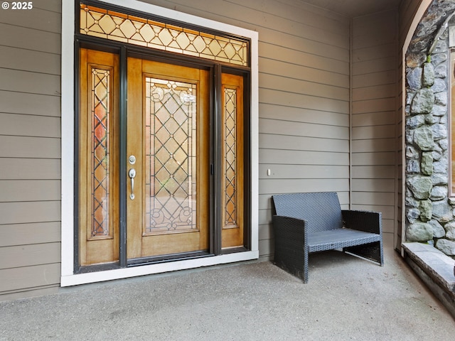 property entrance featuring covered porch