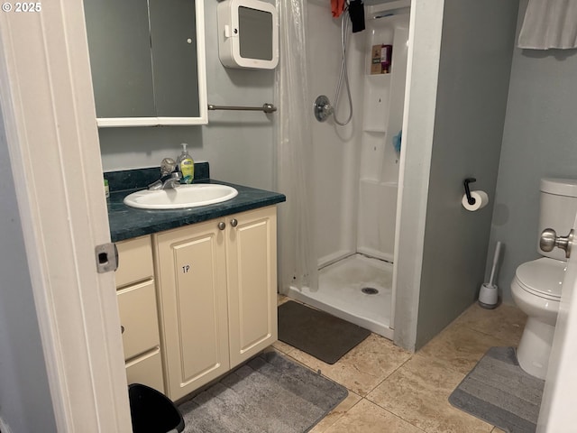 7922 SW Capitol Hill Rd, Portland, OR 97219 - bathroom featuring toilet, a stall shower, vanity, and tile patterned flooring