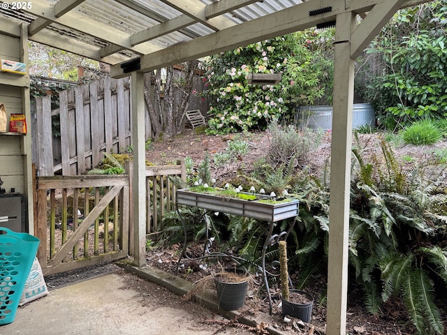 7922 SW Capitol Hill Rd, Portland, OR 97219 - view of patio with a gate and fence