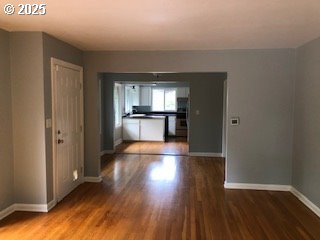 7922 SW Capitol Hill Rd, Portland, OR 97219 - unfurnished room with baseboards and wood finished floors