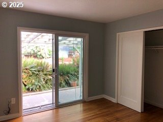 7922 SW Capitol Hill Rd, Portland, OR 97219 - entryway featuring wood finished floors and baseboards