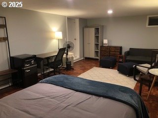 7922 SW Capitol Hill Rd, Portland, OR 97219 - bedroom featuring wood finished floors, recessed lighting, and a desk