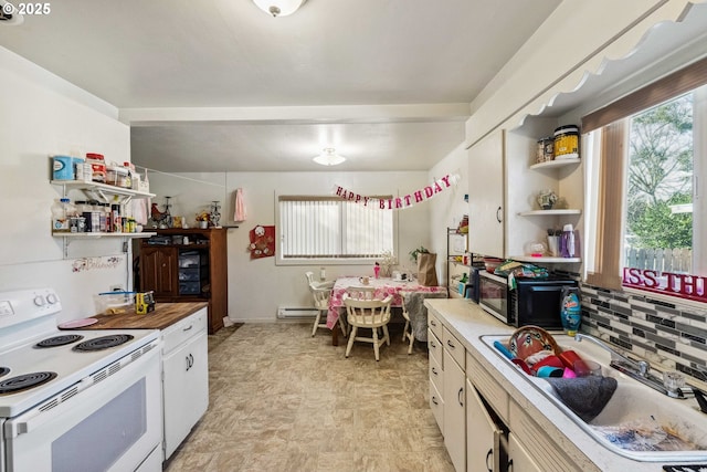 kitchen featuring sink, decorative backsplash, and white range with electric stovetop