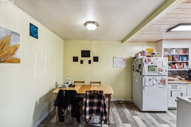 dining area with light wood-type flooring