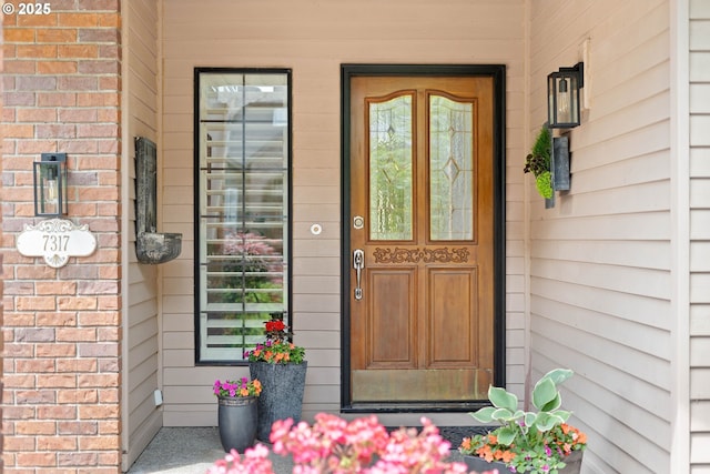 7317 SE 141st Ave, Portland, OR 97236 - entrance to property featuring brick siding
