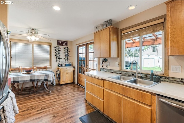 3977 SE Salquist Rd, Gresham, OR 97080 - kitchen featuring stainless steel appliances, a sink, light wood-style flooring, light countertops, and recessed lighting