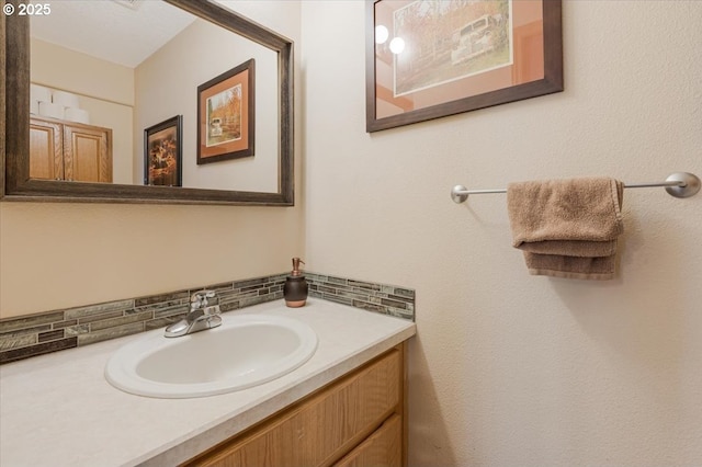 3977 SE Salquist Rd, Gresham, OR 97080 - bathroom with vanity and decorative backsplash
