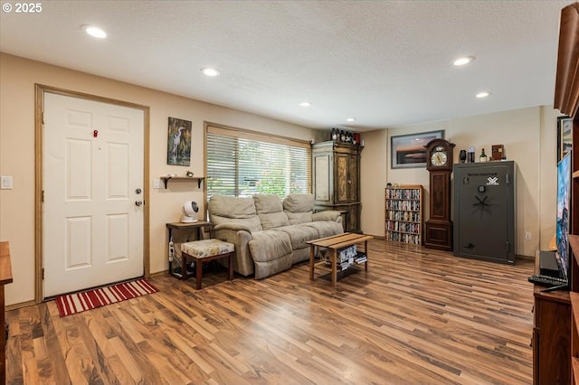 3977 SE Salquist Rd, Gresham, OR 97080 - living room featuring wood finished floors, a textured ceiling, and recessed lighting