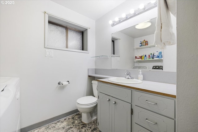 12208 SE 38th Ave, Milwaukie, OR 97222 - bathroom featuring washer and dryer, vanity, and toilet