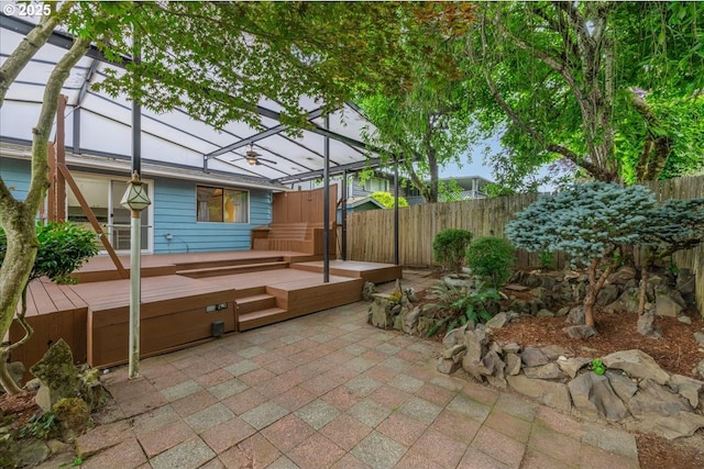 12208 SE 38th Ave, Milwaukie, OR 97222 - fenced backyard with a wooden deck, a patio area, and a pergola