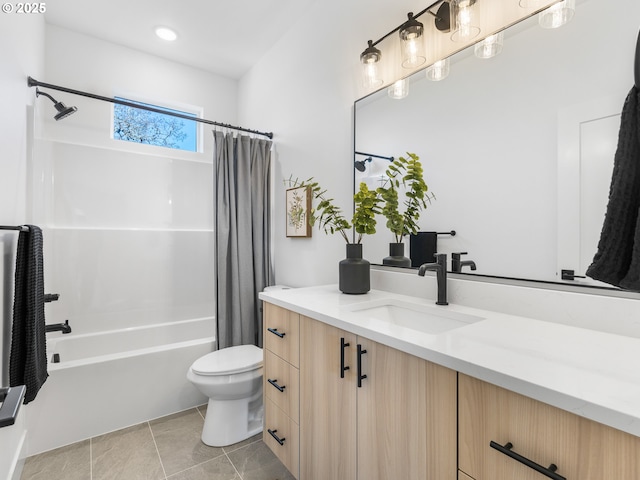 full bathroom featuring toilet, vanity, shower / tub combo, and tile patterned flooring