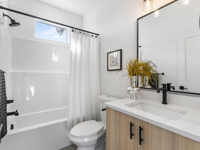 full bathroom featuring toilet, vanity, and shower / bathtub combination with curtain