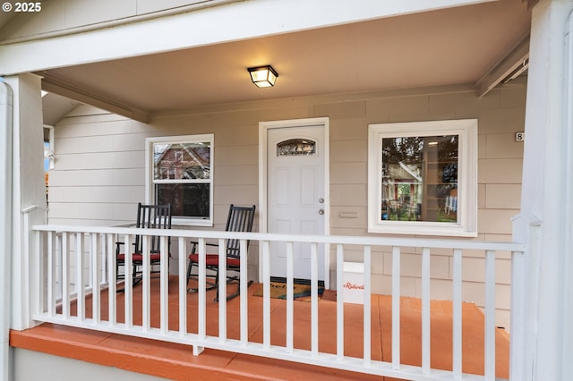 entrance to property with a porch