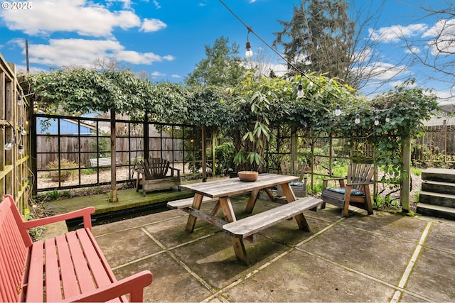 view of patio / terrace featuring a fenced backyard and outdoor dining space