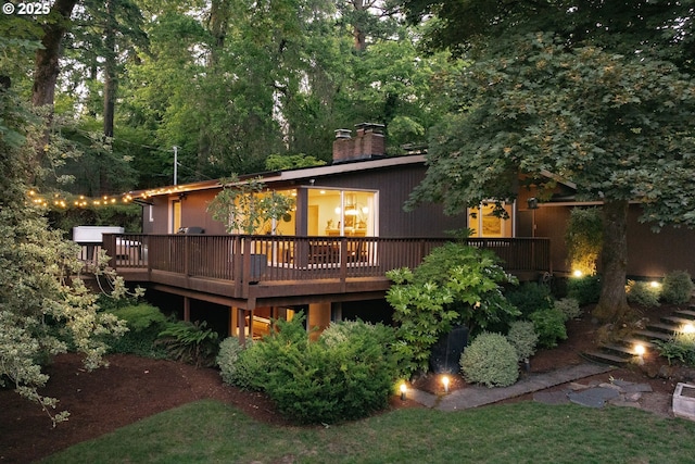5431 SW Alfred St, Portland, OR 97219 - back of property with a deck and a chimney