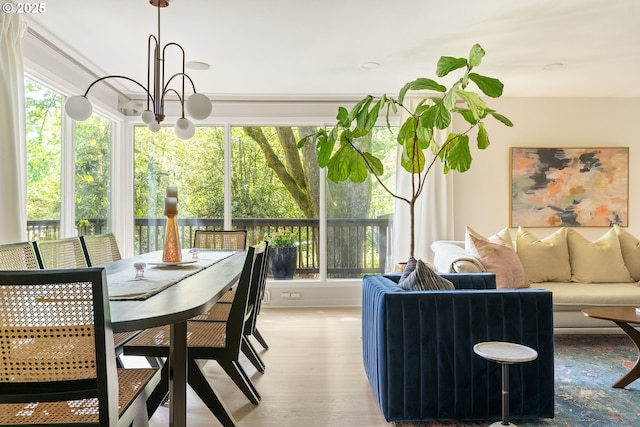 5431 SW Alfred St, Portland, OR 97219 - sunroom featuring healthy amount of natural light and a chandelier