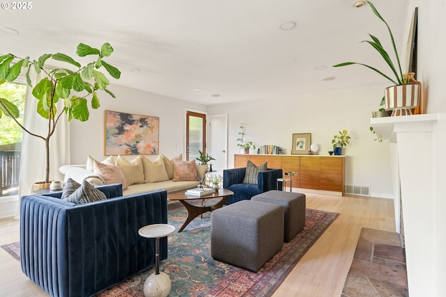 5431 SW Alfred St, Portland, OR 97219 - living area featuring wood finished floors and recessed lighting