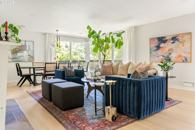 5431 SW Alfred St, Portland, OR 97219 - living room featuring wood finished floors and baseboards