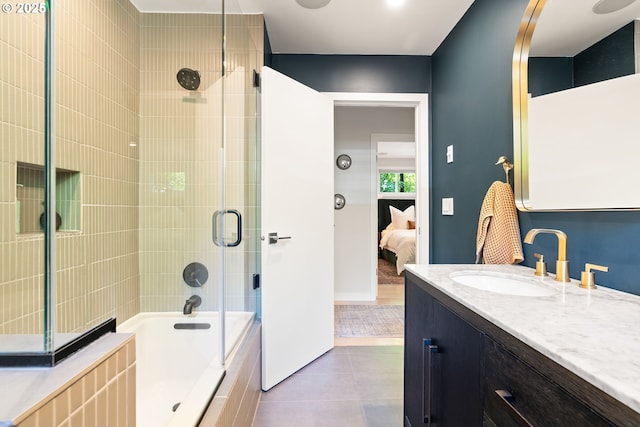 5431 SW Alfred St, Portland, OR 97219 - ensuite bathroom with tile patterned flooring, vanity, enclosed tub / shower combo, and baseboards