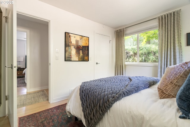 5431 SW Alfred St, Portland, OR 97219 - bedroom with wood finished floors and baseboards