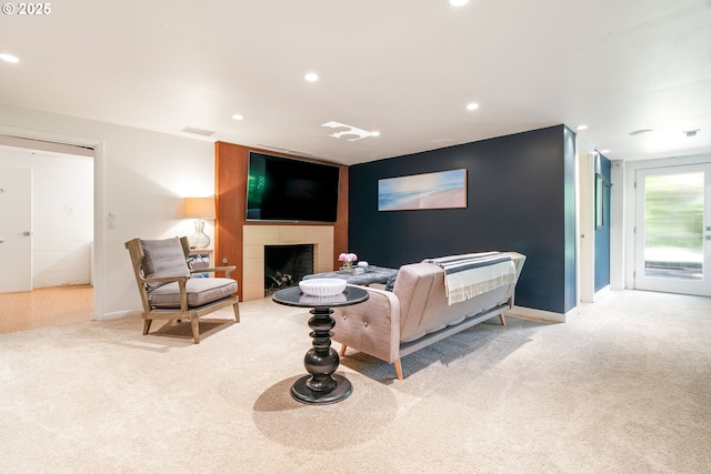 5431 SW Alfred St, Portland, OR 97219 - living area with carpet floors, recessed lighting, a large fireplace, and baseboards