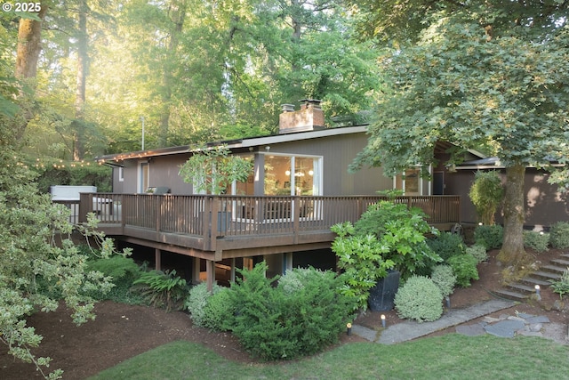 5431 SW Alfred St, Portland, OR 97219 - back of property featuring a wooden deck and a chimney