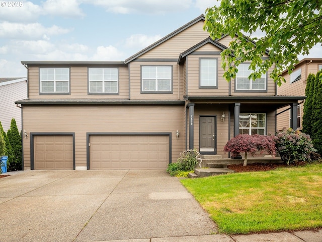 2530 NW 22nd Ave, Camas, WA 98607 - view of front of house with a garage, concrete driveway, and a front yard