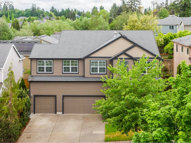2530 NW 22nd Ave, Camas, WA 98607 - view of front of house featuring an attached garage, concrete driveway, and a shingled roof