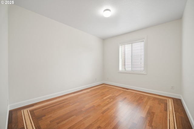 2530 NW 22nd Ave, Camas, WA 98607 - empty room with baseboards and light wood-style flooring