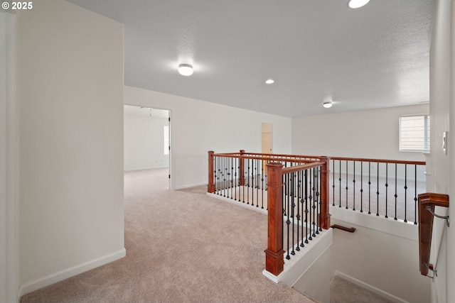2530 NW 22nd Ave, Camas, WA 98607 - corridor featuring an upstairs landing, carpet floors, baseboards, recessed lighting, and a textured ceiling