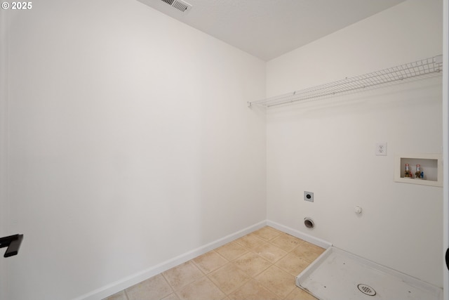 2530 NW 22nd Ave, Camas, WA 98607 - laundry room with hookup for a washing machine, hookup for an electric dryer, baseboards, hookup for a gas dryer, and light tile patterned flooring