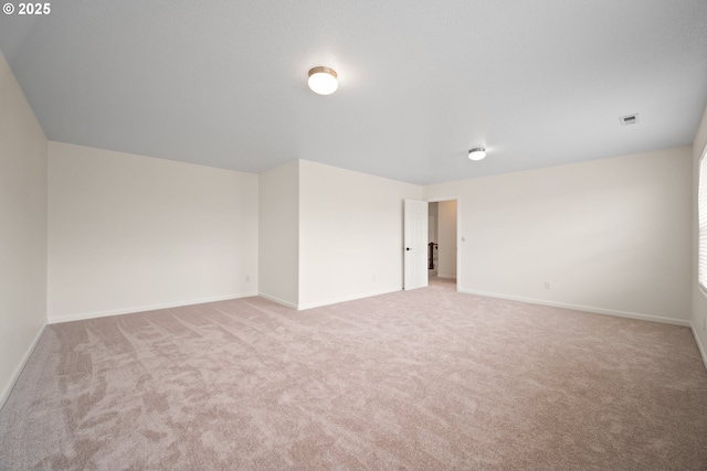 2530 NW 22nd Ave, Camas, WA 98607 - spare room featuring light colored carpet and baseboards