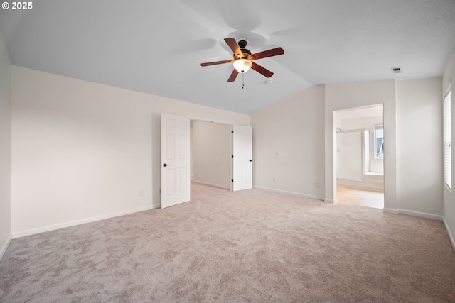 2530 NW 22nd Ave, Camas, WA 98607 - empty room featuring ceiling fan, vaulted ceiling, light colored carpet, and baseboards