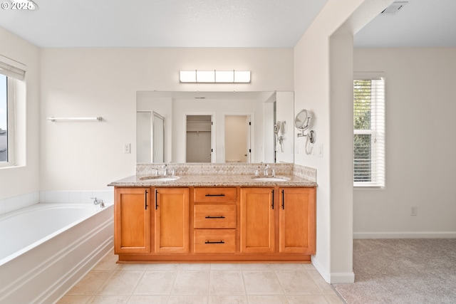 2530 NW 22nd Ave, Camas, WA 98607 - bathroom with double vanity, a garden tub, and a shower with door