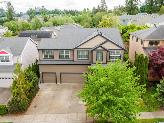2530 NW 22nd Ave, Camas, WA 98607 - view of front of house featuring concrete driveway, an attached garage, a residential view, and a shingled roof